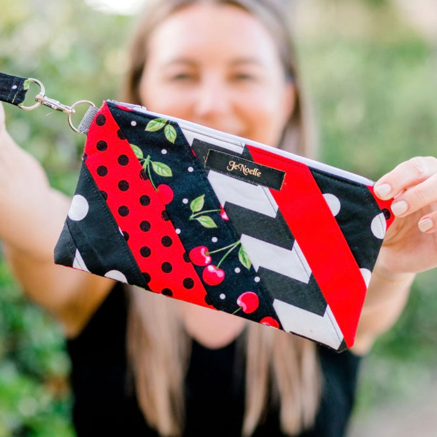 Black Cherry Quilted Striped Wristlet